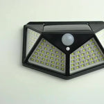 Foco Solar 100 LED IP65 con Sensor de Movimiento — 3 Modos Jardín y Exterior